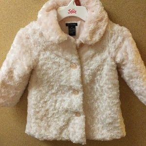 Child’s plush pale pink jacket